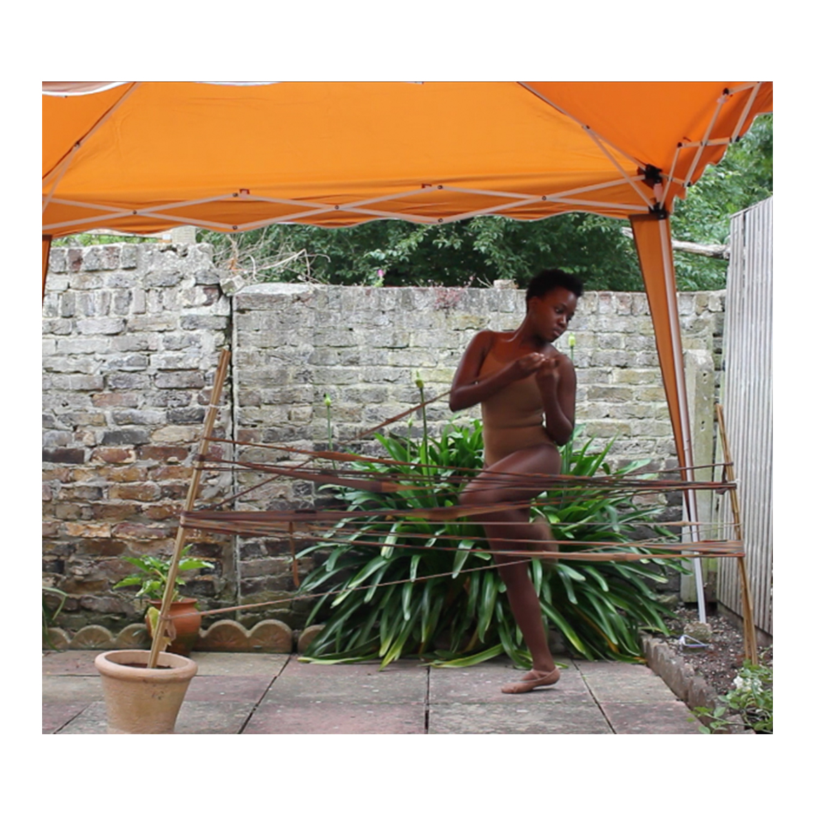 @enamdg (Enam Gbewonyo)
Nude Me/Under the Skin: Unveiling our stories, one Black NHS Nurse at a time, (2019 - )
Bamboo sticks, used tights, wooden tights and individual artworks (Ekua Etsibah, Mrs Dawn Hill CBE, Mavis Gbewonyo, Olive Gbewonyo and Donna Simpson:
Individual artwork mediums: printed family photographs on tea stained recycled paper, tea stained recycled card, used burnout tights, cotton thread, PVA glue and acrylic metallic paint